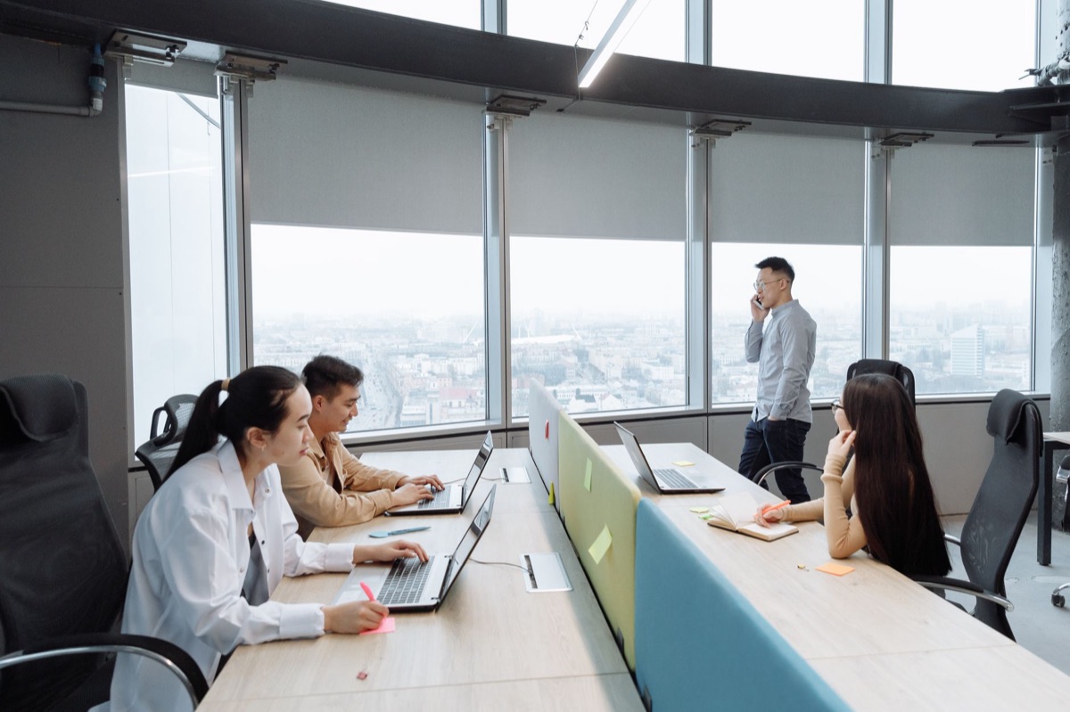 Korean AI startup office with team working on projects