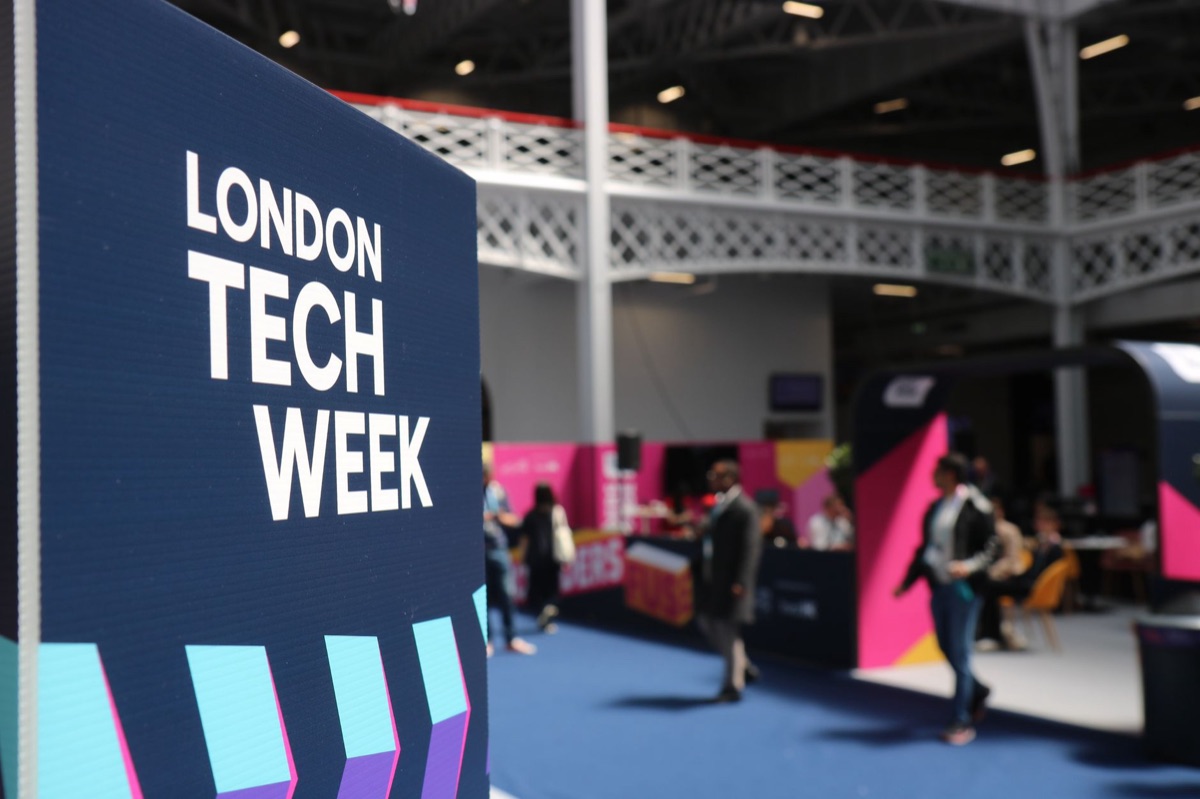 AI technology exhibition with data analysis displays